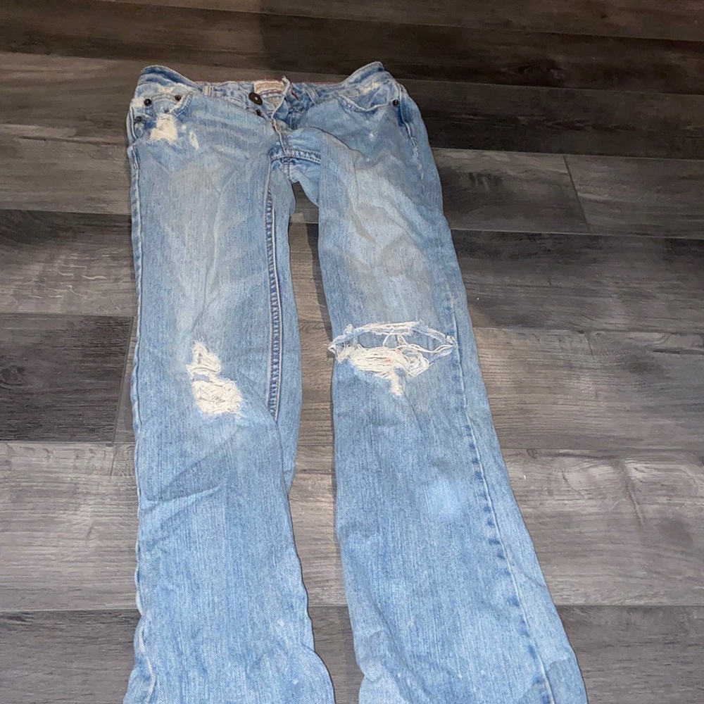 Light wash distressed jeans